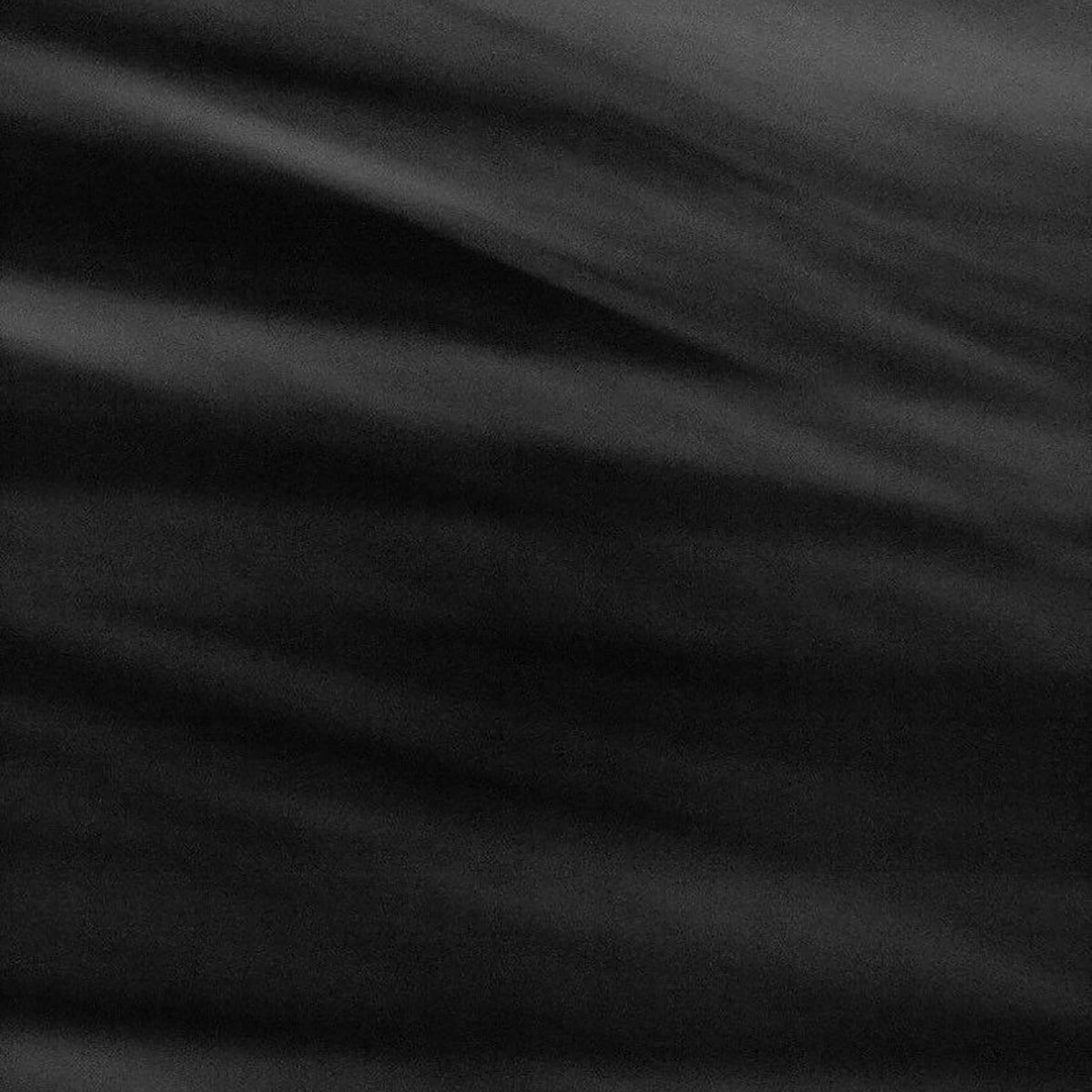 Close-up of black silk fabric for eye mask